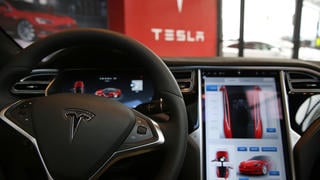The dashboard of a Tesla Motors autonomous vehicle, unveiled in July 2016 in New York. For the moment, drivers can take back control of the vehicle if required.
