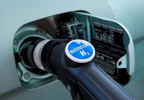 Close up of a hydrogen nozzle in a service station.