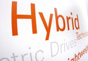 Image showing a “hybrid” logo at the North American International Auto Show, known as the Detroit Auto Show.