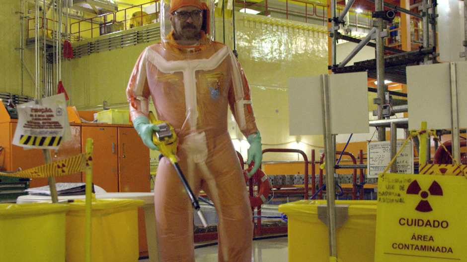 Nuclear workers at work in their protective suits