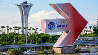 Sign reading “COP31 Antalya” near the entrance to the Antalya Expo Center in Turkey.