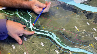 Analysis of aerial images to study the geology surrounding a hydrocarbon deposit.