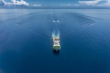 A seismic survey vessel tows streamers of ultra-sensitive hydrophones