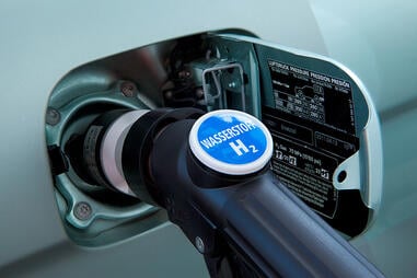Close up of a hydrogen nozzle in a service station.