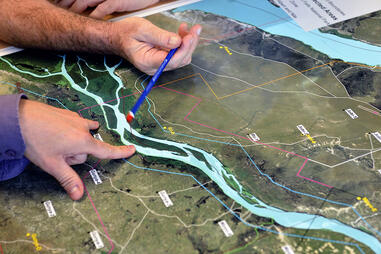 Analysis of aerial images to study the geology surrounding a hydrocarbon deposit.